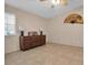 Spacious bedroom with dresser and ceiling fan at 1510 Mahogany Ln # 606, Palm Harbor, FL 34683