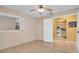 Simple bedroom with window seat and access to kitchen at 1510 Mahogany Ln # 606, Palm Harbor, FL 34683