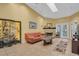 Spacious living room with fireplace and patio doors at 1510 Mahogany Ln # 606, Palm Harbor, FL 34683
