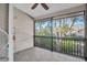 Peaceful screened porch with a view of the backyard at 1510 Mahogany Ln # 606, Palm Harbor, FL 34683