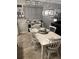 Kitchen dining area with farmhouse style table and chairs at 10311 Planer Picket Dr, Riverview, FL 33569