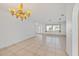 Bright dining room with tile flooring and chandelier at 1713 Grand Central Dr, Tarpon Springs, FL 34689