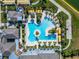 Resort-style pool with lap lanes and lounging areas at 31451 Moniker Mast Ln, San Antonio, FL 33576