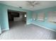 Sunroom with light teal walls and tile floors at 348 Bahia Vista Dr, Indian Rocks Beach, FL 33785