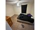 Bedroom with a queen-size bed and tiled floor at 8823 W Robson St, Tampa, FL 33615