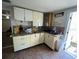 Galley kitchen with granite countertops at 8823 W Robson St, Tampa, FL 33615