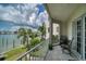 Relaxing balcony with water views and comfortable seating at 140 Brightwater Dr # 6, Clearwater Beach, FL 33767