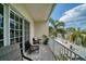 Enjoy peaceful water views from this balcony, featuring comfortable seating at 140 Brightwater Dr # 6, Clearwater Beach, FL 33767