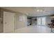 Finished basement with tile flooring and access to backyard at 140 Brightwater Dr # 6, Clearwater Beach, FL 33767