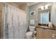 Bathroom with shower and granite countertop at 140 Brightwater Dr # 6, Clearwater Beach, FL 33767
