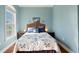 Bedroom with a queen-size bed and hardwood floors at 140 Brightwater Dr # 6, Clearwater Beach, FL 33767