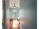 Bright bedroom with hardwood floors and crib at 140 Brightwater Dr # 6, Clearwater Beach, FL 33767