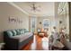 Bright guest room with hardwood floors and a comfortable daybed at 140 Brightwater Dr # 6, Clearwater Beach, FL 33767
