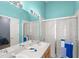 Double vanity bathroom with shower and mirror at 3010 Bayshore Pointe Dr, Tampa, FL 33611