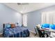 Bedroom with a workspace and a ceiling fan at 3010 Bayshore Pointe Dr, Tampa, FL 33611