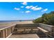 Relaxing boardwalk with benches overlooking the water at 3010 Bayshore Pointe Dr, Tampa, FL 33611