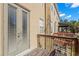 Private deck with double doors and wooden railings at 3010 Bayshore Pointe Dr, Tampa, FL 33611