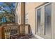 Deck access with double doors and wooden railings at 3010 Bayshore Pointe Dr, Tampa, FL 33611