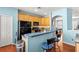Kitchen boasts black appliances and an island with a breakfast bar at 3010 Bayshore Pointe Dr, Tampa, FL 33611