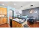 Modern kitchen with double sink, ample counter space, and breakfast bar at 3010 Bayshore Pointe Dr, Tampa, FL 33611
