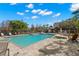 Inviting community pool with surrounding lounge chairs at 3010 Bayshore Pointe Dr, Tampa, FL 33611