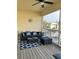 Relaxing balcony with outdoor furniture and water views at 844 Callista Cay Loop, Tarpon Springs, FL 34689
