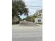 Community entrance with gated access and landscaping at 844 Callista Cay Loop, Tarpon Springs, FL 34689