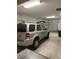 Spacious garage with ample room for a vehicle and storage at 844 Callista Cay Loop, Tarpon Springs, FL 34689