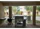 Outdoor grilling area with gas and charcoal grills at 844 Callista Cay Loop, Tarpon Springs, FL 34689