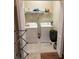 Functional laundry room with washer, dryer and storage shelves at 844 Callista Cay Loop, Tarpon Springs, FL 34689