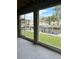 Waterfront view from a screened porch overlooking boats and docks at 844 Callista Cay Loop, Tarpon Springs, FL 34689
