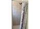 Clean shower stall with tiled walls and a shower curtain at 844 Callista Cay Loop, Tarpon Springs, FL 34689