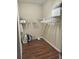 Large walk-in closet with double rods at 844 Callista Cay Loop, Tarpon Springs, FL 34689