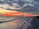 Stunning sunset over the ocean with colorful clouds and beach at 4621 Gulf Of Mexico Dr # D10, Longboat Key, FL 34228