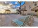 Beachfront patio with lounge chairs and thatched umbrellas offers relaxing ocean views at 4621 Gulf Of Mexico Dr # D10, Longboat Key, FL 34228