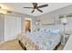Bedroom with coastal decor and en-suite bathroom at 4621 Gulf Of Mexico Dr # D10, Longboat Key, FL 34228
