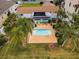 Inviting heated pool with spa in a backyard oasis at 11800 7Th E St, Treasure Island, FL 33706