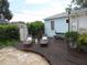 Relaxing backyard with a wooden deck and lounge chairs at 3246 Prescott N St, St Petersburg, FL 33713