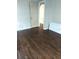 Spacious bedroom with hardwood floors and an arched entryway at 3246 Prescott N St, St Petersburg, FL 33713