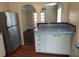 Kitchen with blue countertops and stainless steel fridge at 3246 Prescott N St, St Petersburg, FL 33713