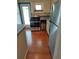 Kitchen with stainless steel appliances and wood floors at 3246 Prescott N St, St Petersburg, FL 33713