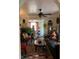 Living room with a dark leather couch, coffee table, and view into the dining area at 3246 Prescott N St, St Petersburg, FL 33713