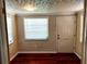 Small room with wood-paneled walls and hardwood floor at 3246 Prescott N St, St Petersburg, FL 33713