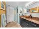 Elegant bathroom with vessel sink, granite vanity, and walk-in shower at 5940 Pelican Bay S Plz # 1106, Gulfport, FL 33707