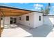 Covered patio with concrete flooring and sliding glass door access at 6318 S Renellie Ct, Tampa, FL 33616