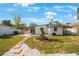 Landscaped backyard with patio and stepping stone pathway at 6318 S Renellie Ct, Tampa, FL 33616