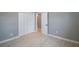 Bright bedroom with light flooring and double door closet at 6318 S Renellie Ct, Tampa, FL 33616