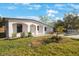 Newly renovated home with a landscaped front yard at 6318 S Renellie Ct, Tampa, FL 33616