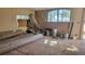 Under construction interior room with new flooring and drywall at 12403 Banbury Ave, New Port Richey, FL 34654