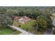 Aerial view showing a single-story home with a spacious yard at 1406 E Spencer St, Plant City, FL 33563